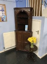 Oak corner cabinet and an oak occasional table