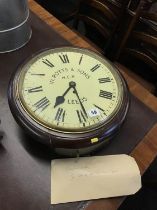 A mahogany cased wall clock with fusee movement by W. Potts and Sons, North Eastern Railway, Leeds