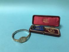A Ladies 9ct gold watch and a 9ct gold fob, 6g