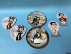Four Wade 'Betty Boop' wall plaques and two Doulton plates (6)