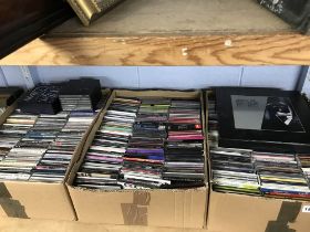 Three boxes of CDs