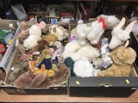 Two trays of soft toys