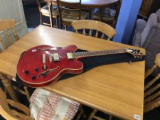 A Gould GS 135 electric guitar and soft case