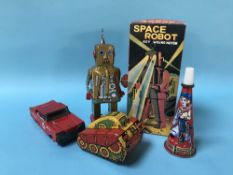 Collection of tinplate toys, Space Robot, Fire Chief, Rolling Tank etc.
