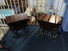 A pair of reproduction mahogany nest of tables