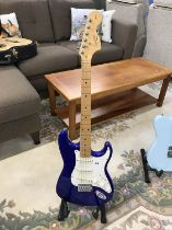 A Squier Fender Strat electric guitar