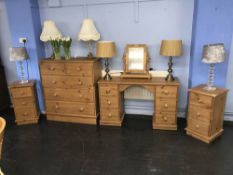 Pair of pine bedside chests, dressing table and a pine chest of drawers