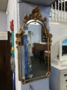An ornate rectangular mirror, 114 x 62cm