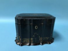 A Victorian papier mache tea caddy