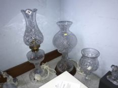 A Waterford crystal style table lamp, a hurricane lamp and a cut glass table lamp (3)