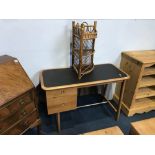 A desk and bamboo corner unit