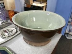 A large earthenware saltglaze bowl