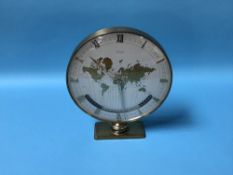 A Kienzle World map clock, with 24 hour aperture