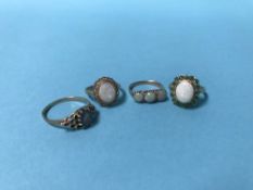Four 9ct gold opal rings, 10g
