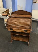 A 1930s oak tambour fronted bureau, with single drawer, W 76cm