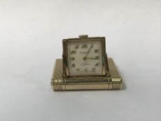 A '9k' gold Dunhill purse watch