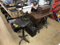A vintage Harrison Patent Knitting machine, a Singer sewing machine and a treadle sewing machine (