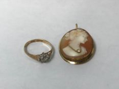 A Cameo, mount stamped '750' and a 9ct gold ring, 1.5g