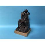 A sculpture of two entwined lovers