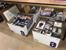 Four boxes to include DVDs, prints etc.