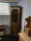 Oak standing corner cabinet