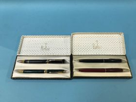 Four boxed Parker ball point pens, various