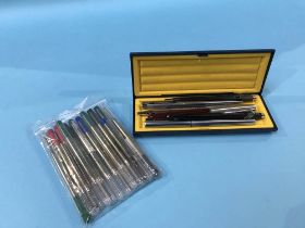 A selection of refills and pens, various