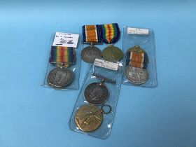 Four matching pairs of World War One medals, awarded to R. E. 254627 SPR. D. E. Morgan, R. A. 955084