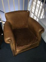 Brown leather armchair