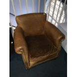 Brown leather armchair