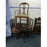 Mahogany occasional table and three chairs