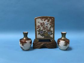 A Japanese Satsuma vase, H 11cm and a pair of miniature vases, H7cm