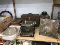 Typewriter, port holes, a till etc.