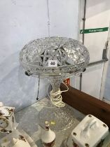A large cut glass table lamp