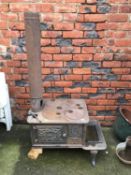 A Columbia Stove Work cast iron stove, D 78cm, W 50cm, H 50cm