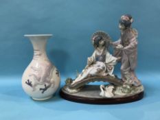 A Lladro group of two Japanese Ladies on a bridge and a Lladro vase, number 5565 (2)