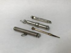 A collection of three silver propelling pens and pencils and one other