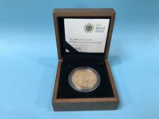 A UK Royal Mint 2008 £5 gold uncirculated coin