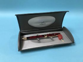 A boxed Parker marbled Sonnet ball point pen