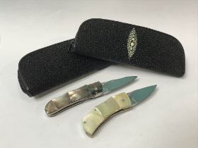 Two Koji Hara pen knives, with slip cases