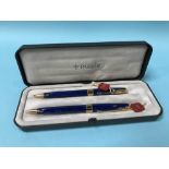 A boxed pair of blue marbled Parker Sonnet ball point pens