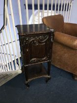 Decorative oak bedside cabinet