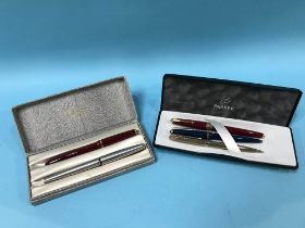 Five Parker fountain and ball point pens, various