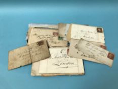 Collection of approximately 45 old Queen Victoria envelopes, with stamps