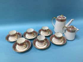 A Paragon coffee set, decorated with bands of roses