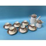 A Paragon coffee set, decorated with bands of roses