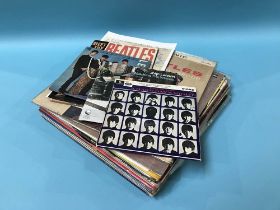 Seventeen various Beatles albums and a selection of singles etc