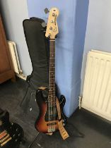 A Fender Precision bass guitar, made in the USA, nos US23001786