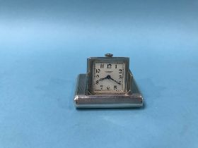 A silver Brevet purse watch