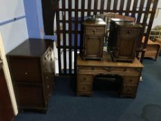 Oak chest of drawers, dressing table and a pair of bedside chests